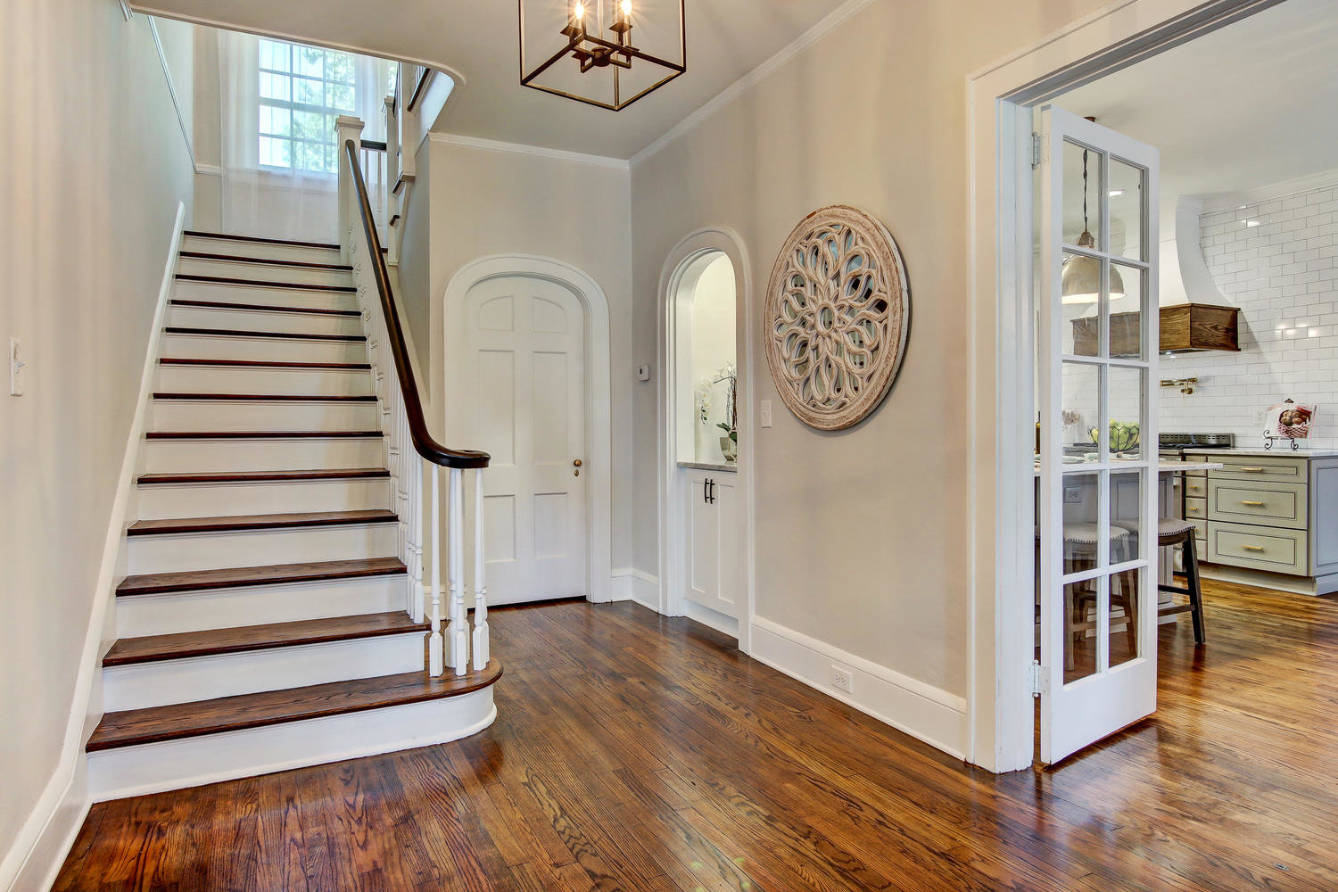 Interior foyer of 1524 Seminole Road in Jacksonville with views of kitchen and stairs